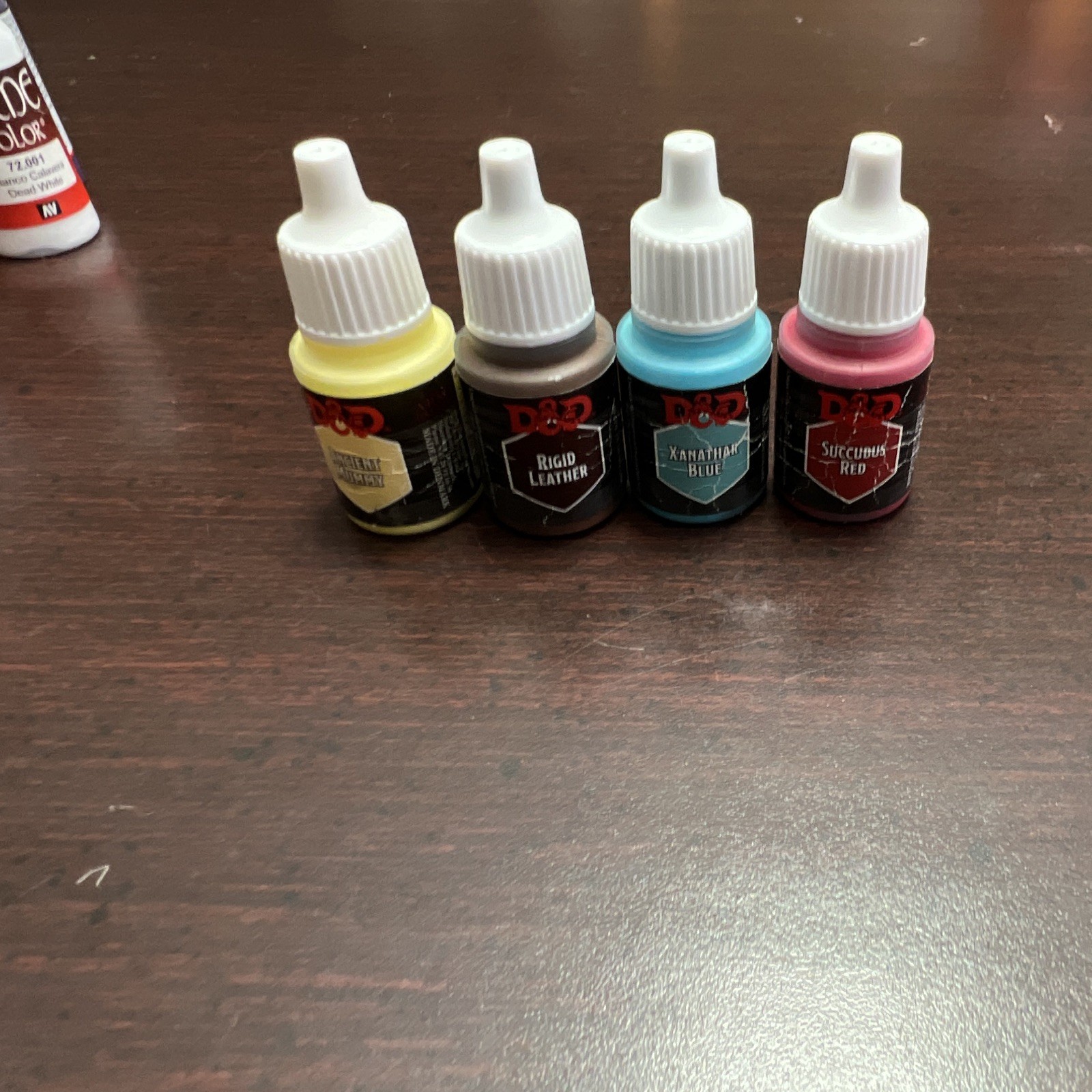 Lot of 16 miniature paints. (Used)