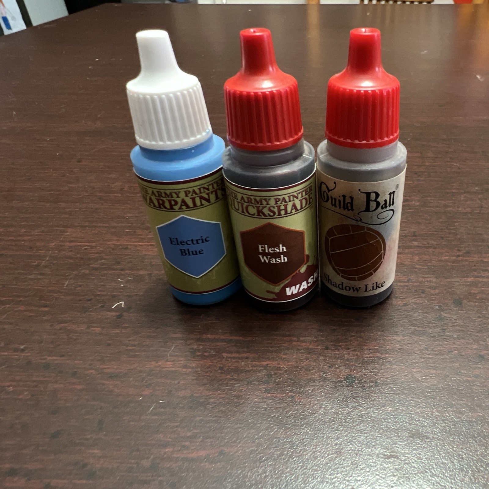 Lot of 16 miniature paints. (Used)