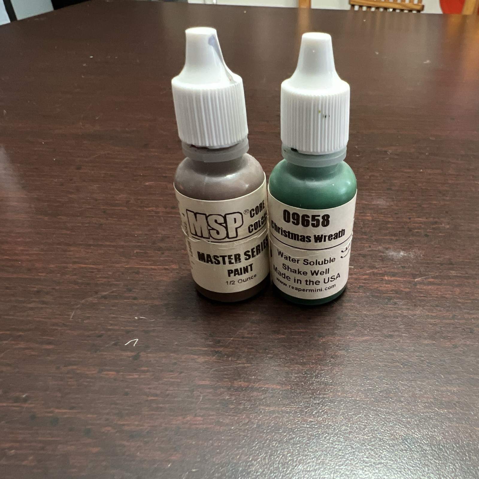 Lot of 16 miniature paints. (Used)